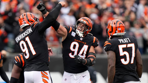 Cincinnati Bengals defensive end Trey Hendrickson (91) and Cincinnati Bengals defensive end Sam Hubbard (94) celebrate a sack in the fourth quarter during an NFL football game between the Seattle Seahawks and the Cincinnati Bengals Sunday, Oct. 15, 2023, at Paycor Stadium in Cincinnati. The Cincinnati Bengals won, 17-13.